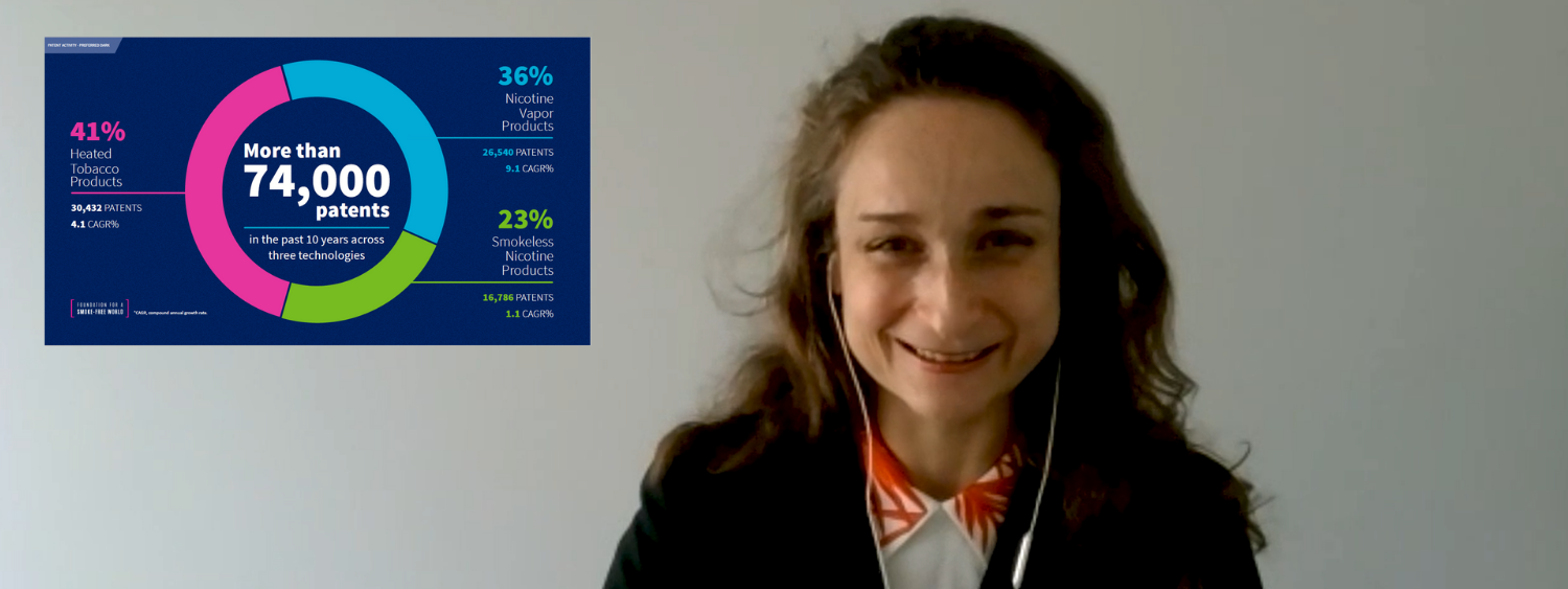 A woman smiling with a graph next to her