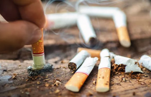 image of cigarettes being put out on table